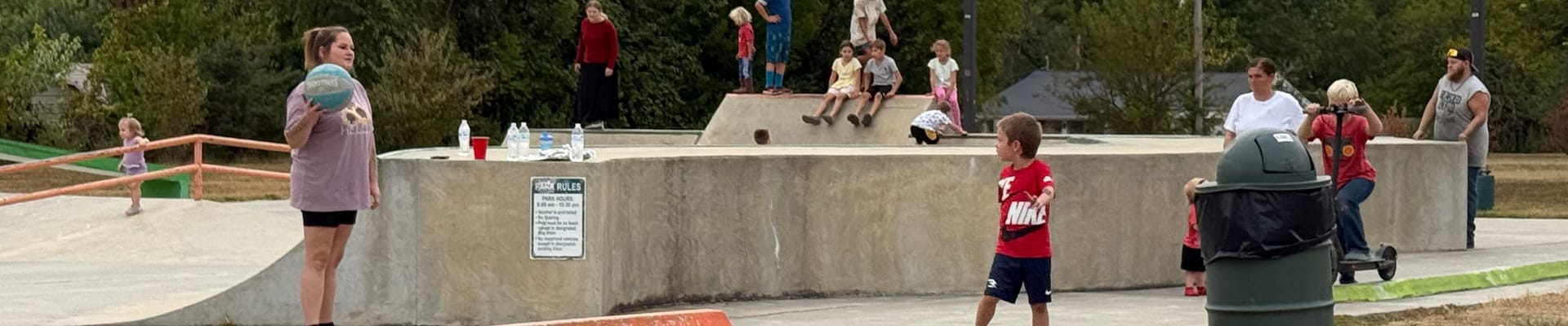 Image of skate park with kids playing