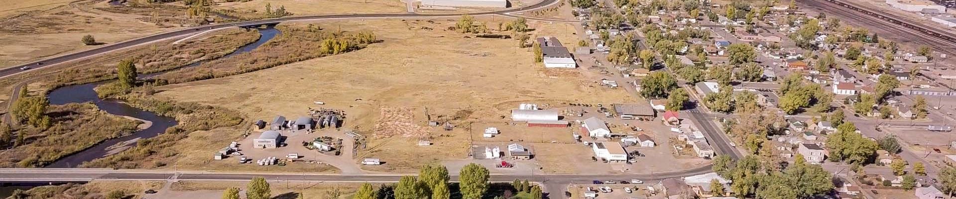 An aerial image of the property in West Side Laramie that is North of the dog park and East of the Laramie River.