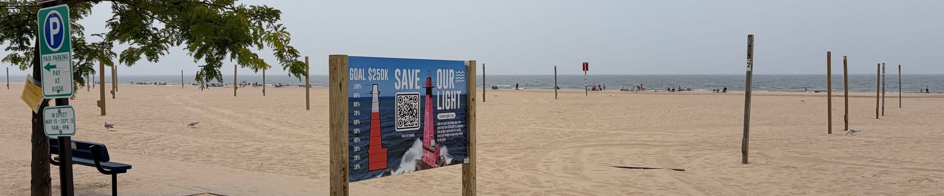 Picture of fundraising banner at the beach.