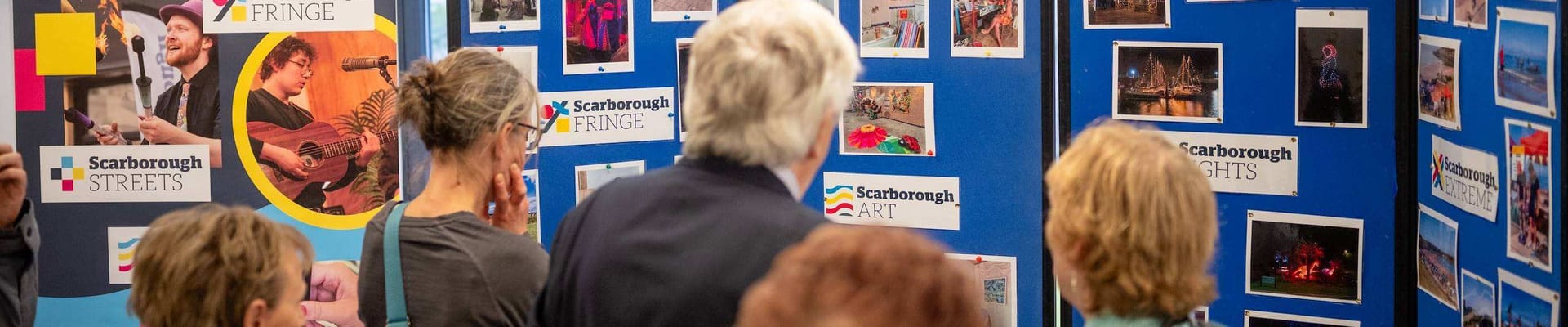 image of attendees looking at scarborough fair stand
