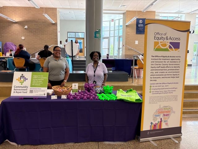 Office of Equity and Access staff sharing information in the community about Community Reinvestment and Repair Fund. 