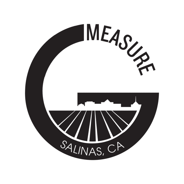 Measure G logo in the shape of a capital G in black with fields and skyline cutout