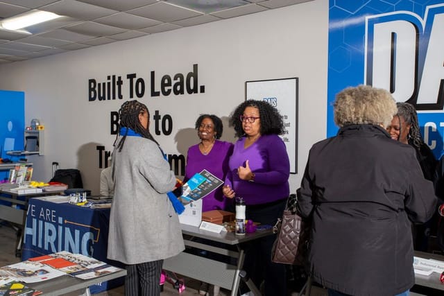 Office of Equity and Access staff sharing information in the community about Community Reinvestment and Repair Fund. 