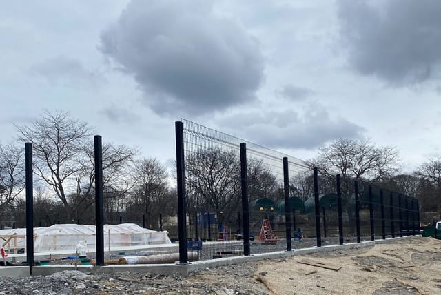 Pool perimeter fence being installed.