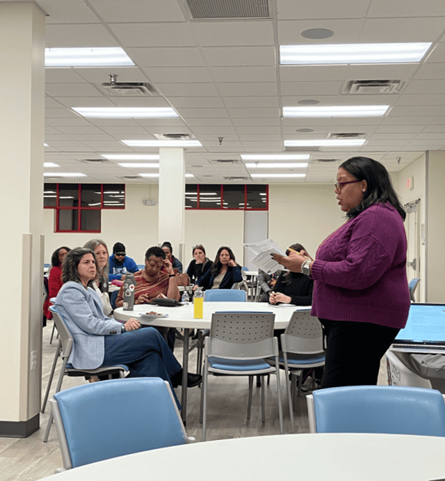 Office of Equity and Access staff sharing information in the community about Community Reinvestment and Repair Fund. 