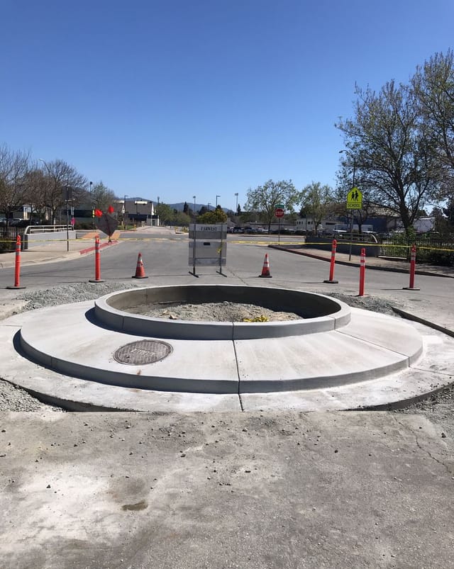 Image of cement poured for the a foundation for traffic circle
