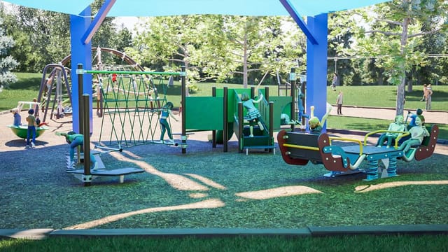 A portion of the playground with balancing and climbing activities under a shade tent.