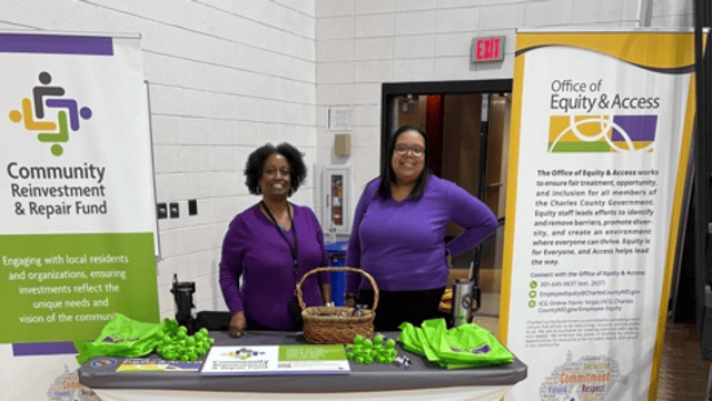 Office of Equity and Access staff sharing information in the community about Community Reinvestment and Repair Fund. 