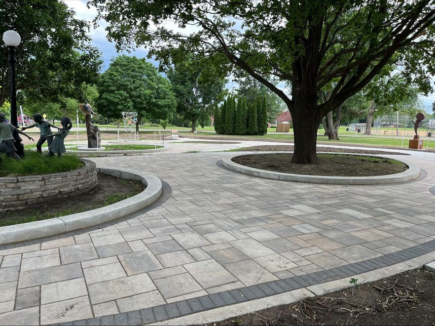 A view of the Sculpture Park with three new sculptures in the background.