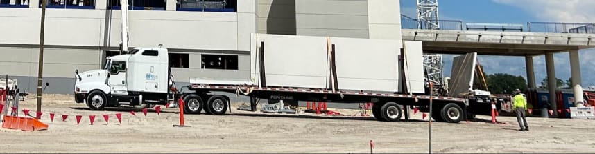 Example of delivery truck carrying concrete precast panels