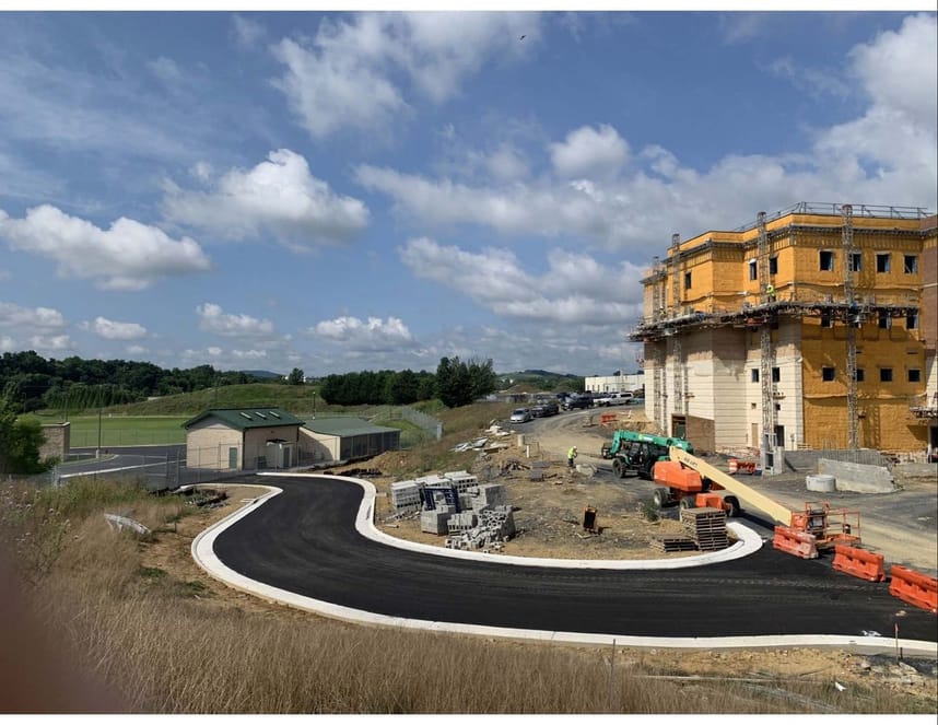 Augusta County courthouse progress July 2025 report, back of courthouse with paved road leading to it