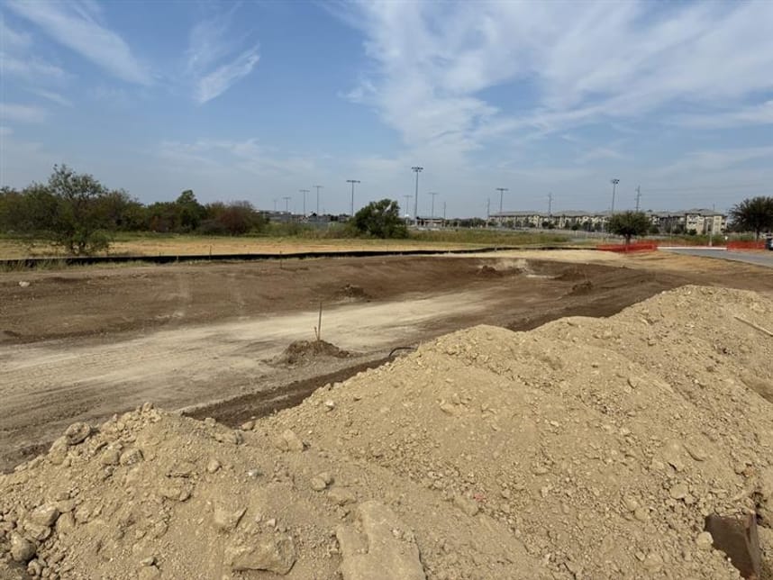 Dirt work for detention pond. 