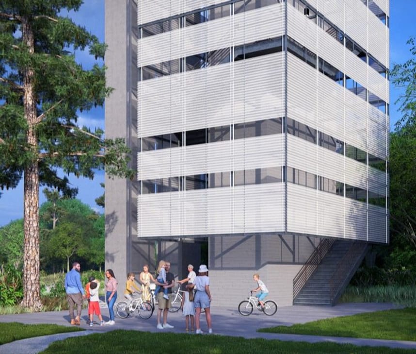  pedestrian bridge elevator and staircase view with people on bike and walking