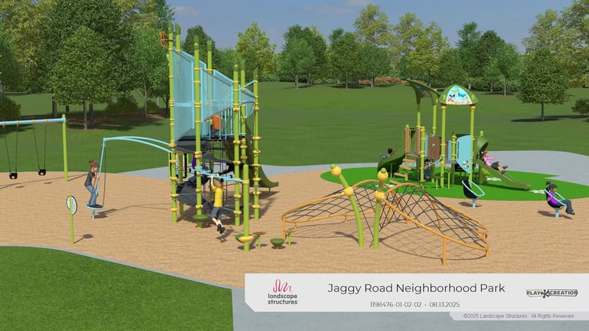 Brightly colored play equipment. One tall tower for older kids and a shorter tower and slide for younger kids. 