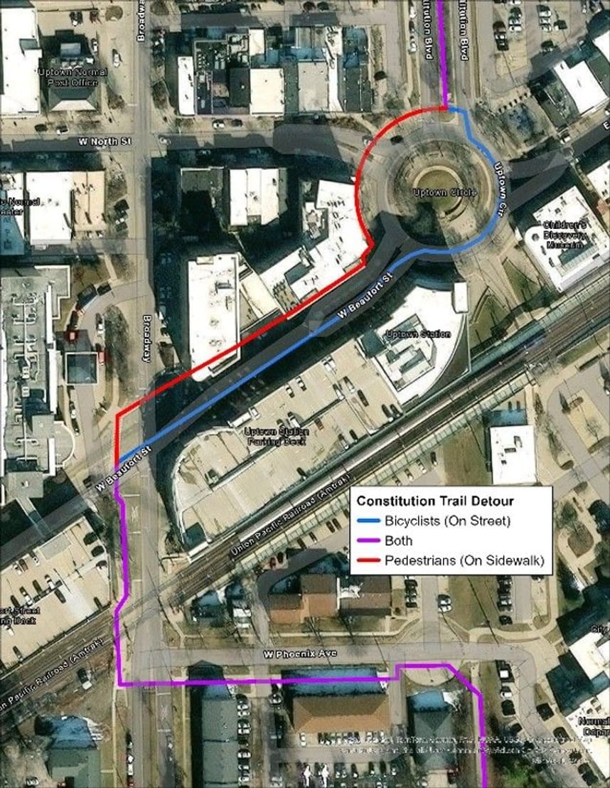 The Constitution Trail Detour begins at Phoenix Avenue. Bicyclists should ride in the street and follow existing traffic patterns. Pedestrians should use the sidewalk on the north side of Beaufort Street. 