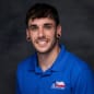 Headshot of Bryce Van Arsdale in a blue city of denton polo