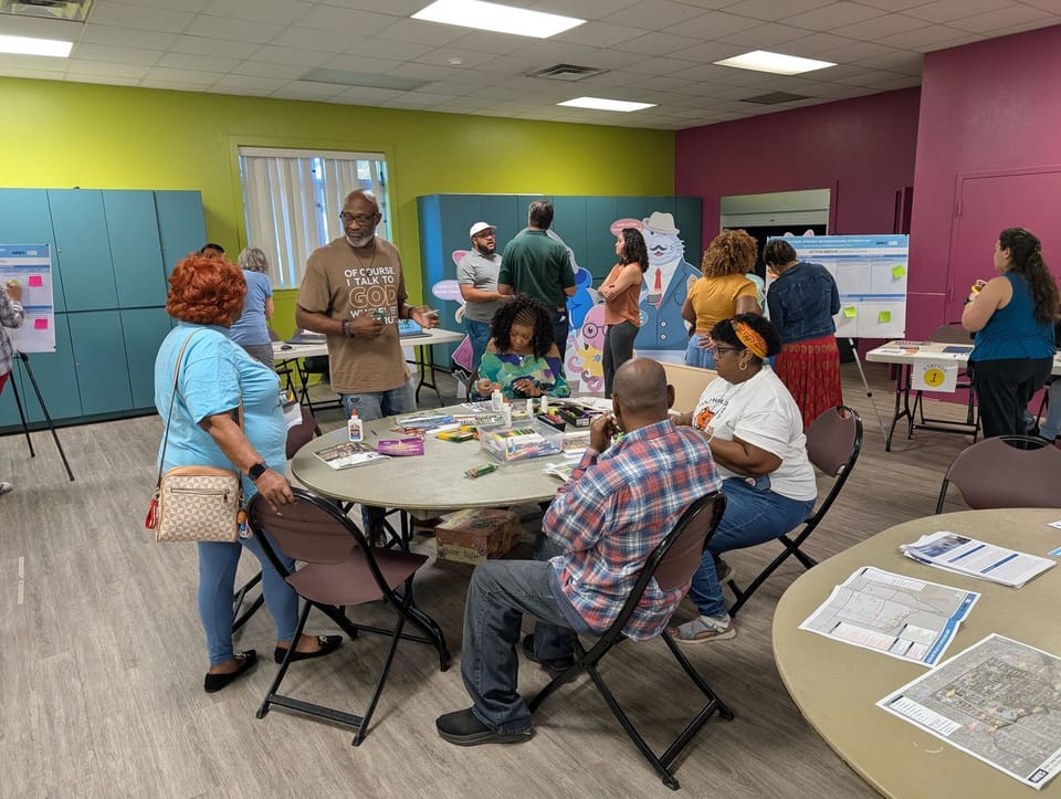 A picture of meeting attendees at the final community workshop of the sulphur springs neighborhood action plan