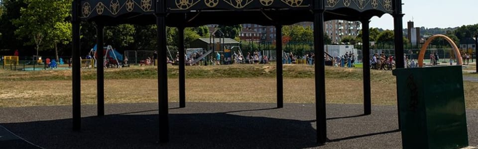 Bandstand with busy park in background