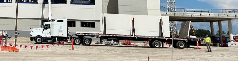 Example of delivery truck carrying concrete precast panels