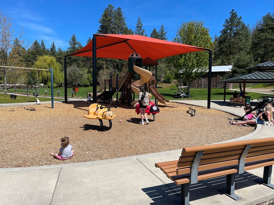 People at Rocky Hill playground structure