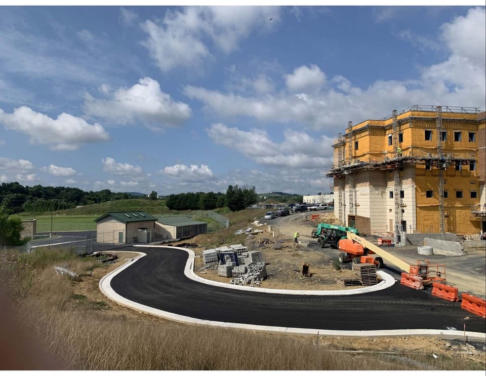 Augusta County courthouse progress July 2025 report, back of courthouse with paved road leading to it