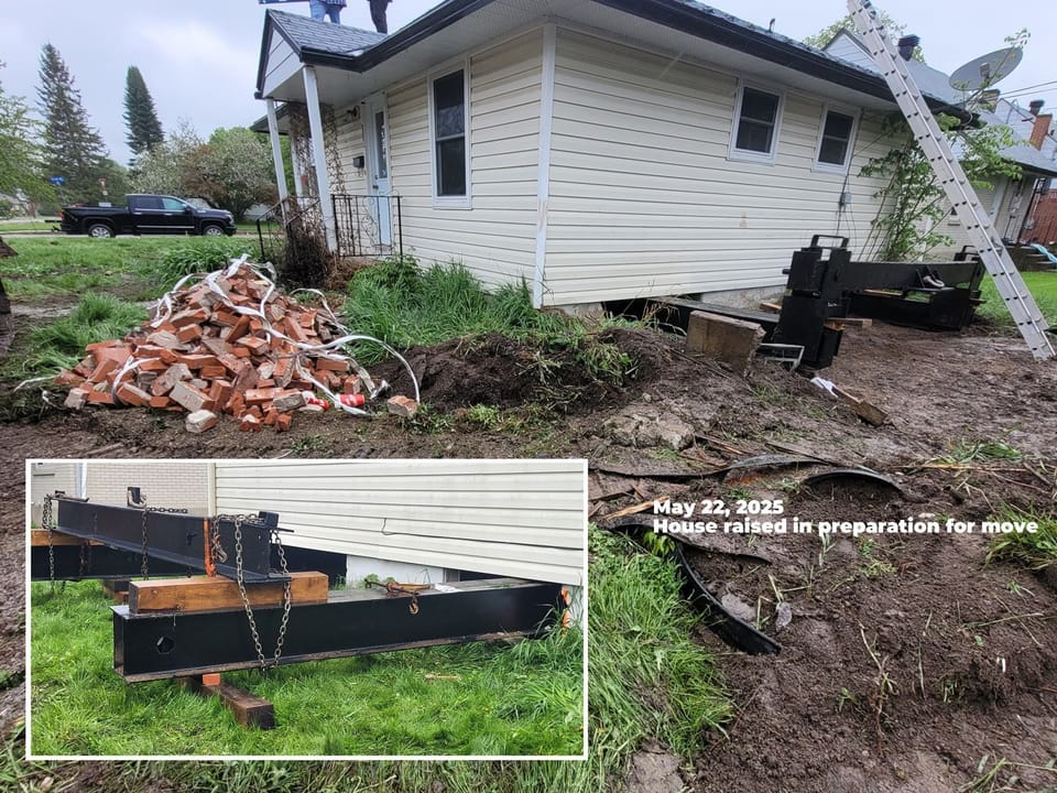 House on steel beams to be moved, inset close up of steel beams under the house