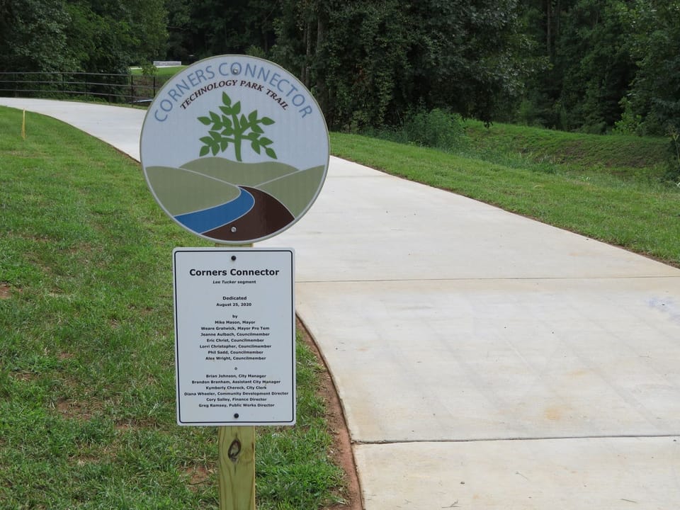 Corners Connector Sign with Tree Image Logo