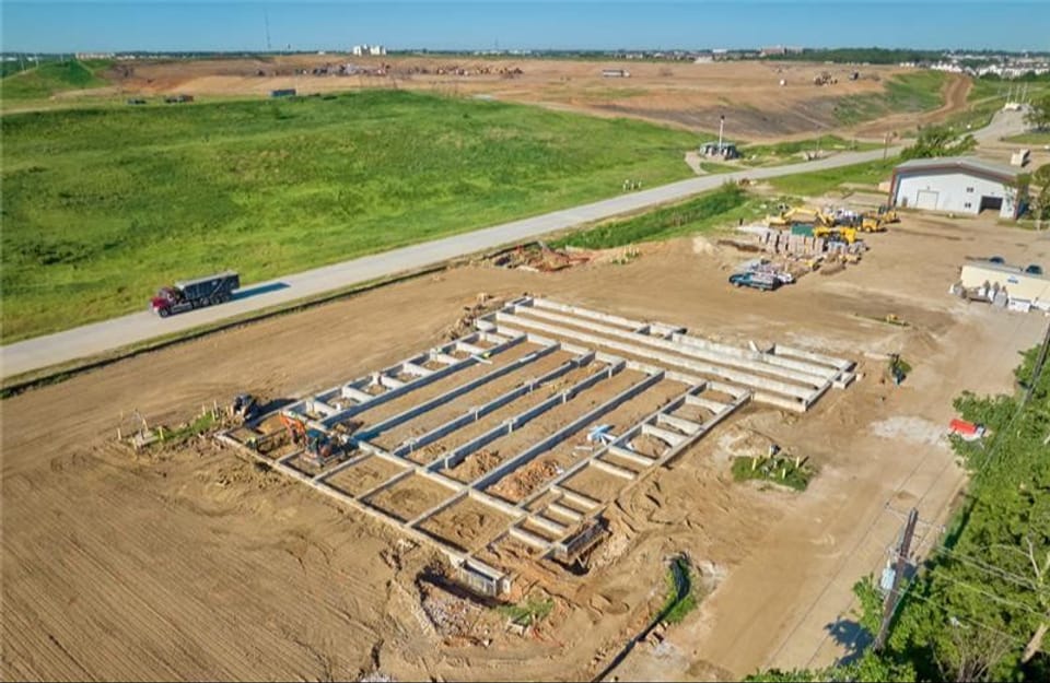 Graphic of foundation being laid