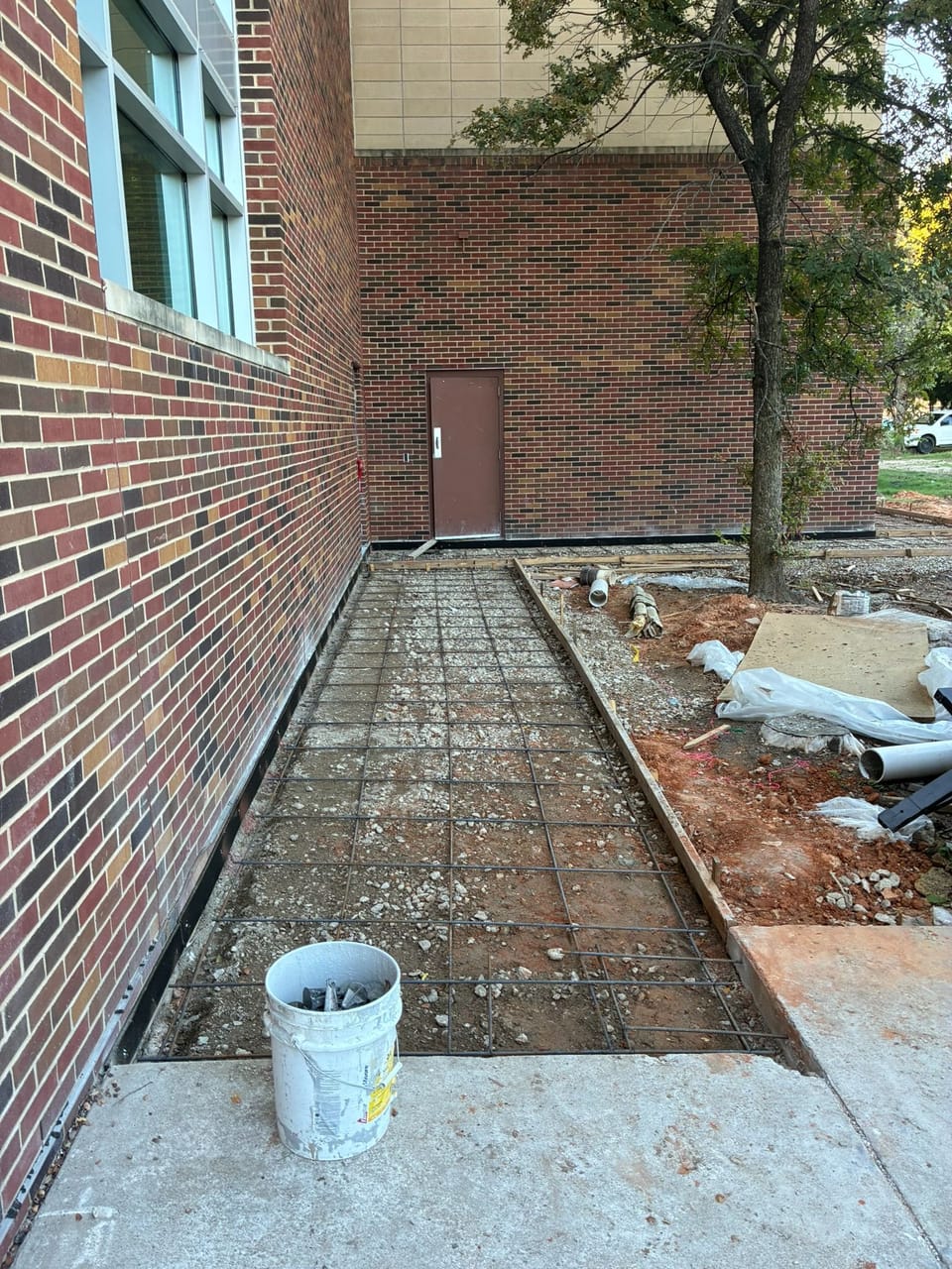 construction area with rebar set for sidewalk concrete pour