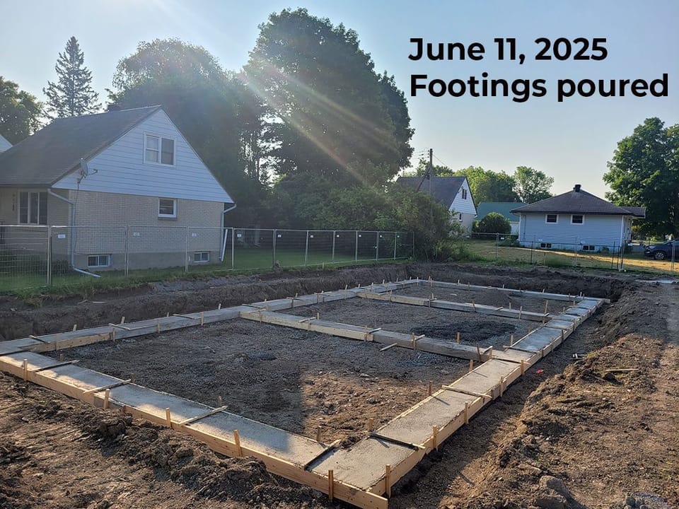 construction site - building footings recently poured still in the forms