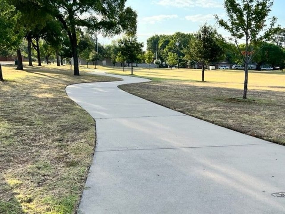 Photo of concrete walking path