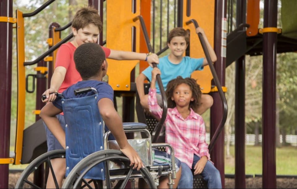 Decorative image showing children playing together on an outdoor playground