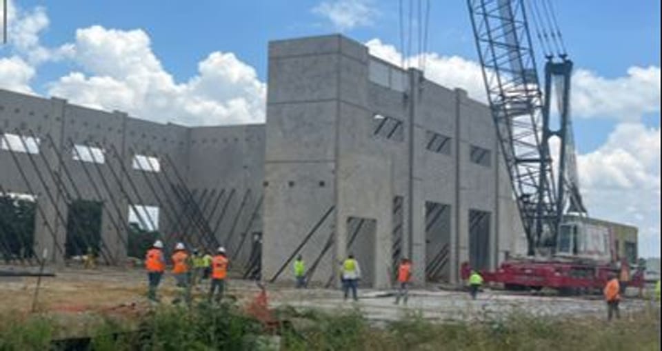 Graphic of building being installed