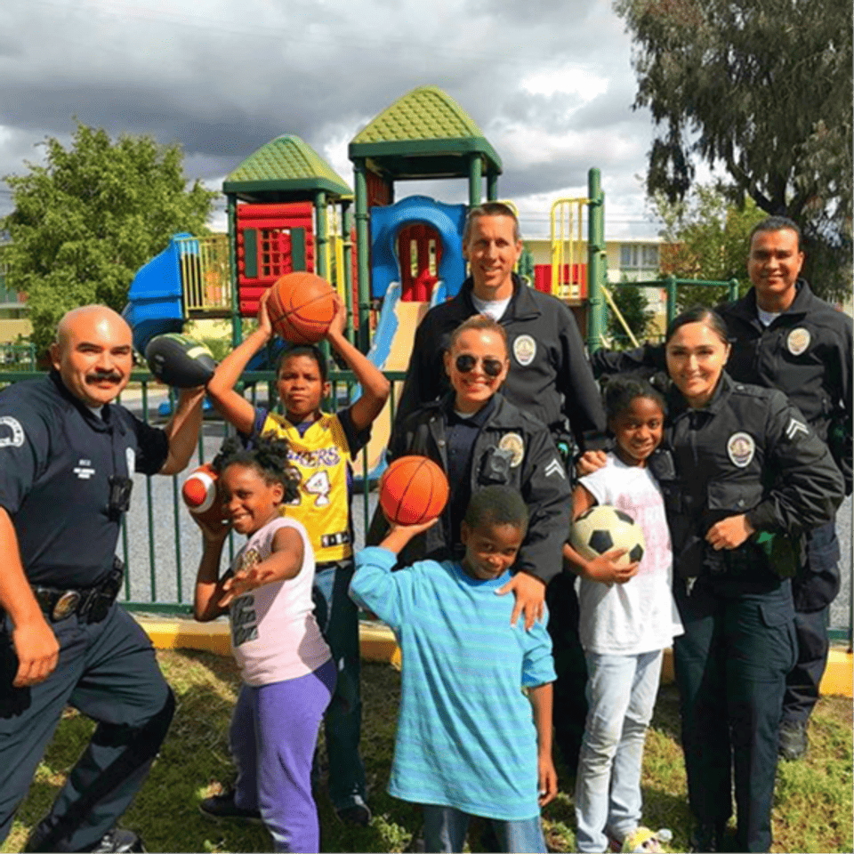A heartening snapshot that captures the spirit of positive police–community interaction in the South Park/South LA area, where the Gilbert Lindsay NEA (Neighborhood Engagement Area) is located.